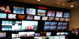 FAA Glitch Grounds ALL Flights! control room with multiple screens and monitors