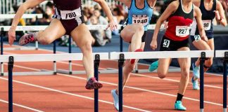 2,293 Gold Medals Vanish – Courts Just Picked Sides Female athletes clearing hurdles on a track