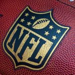 NFL Star Torches State Over DCF Custody Bomb Close-up of an NFL football with the logo prominently displayed