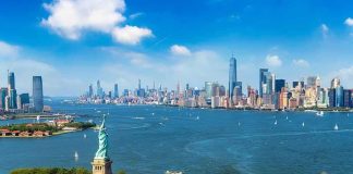 Statue of Liberty overlooking New York Harbor and skyline