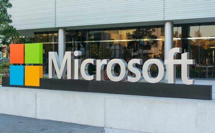 shutterstock_232670755 Microsoft logo displayed outside a modern office building