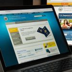 State Department’s Travel RED ALERT Laptop displaying U.S. passport application website