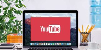 Deepfake Ads Are Flooding Campaigns – Here’s How to Spot Them YouTube logo on a laptop screen on desk.
