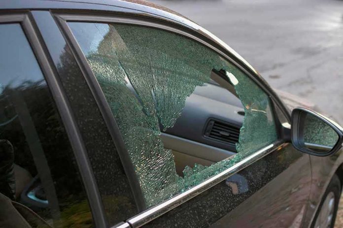 shutterstock_1122859628 car with shattered side window