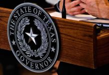 Texas governor seal on wooden podium