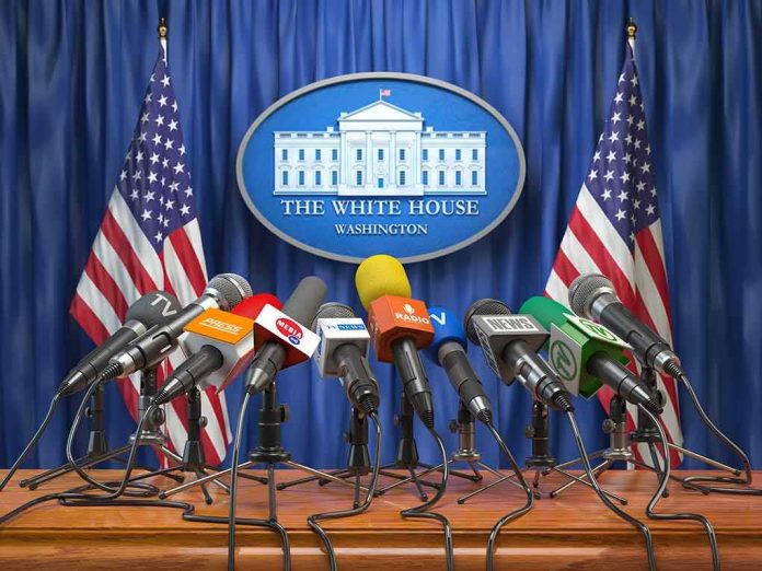 shutterstock_1186435138-1 Press microphones at a White House briefing podium