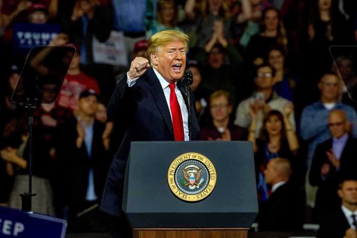 Donald Trump speaking at a rally behind a presidential podium