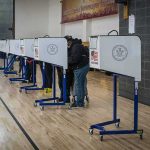 Trump Heads Straight To El-Sayed, Confronts Brotherhood Ties Voters at polling booths in a gymnasium