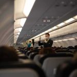 Hollywood Star Detained on Flight After Rage Attack Flight attendant demonstrates safety procedures in airplane cabin