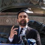 Mamdani Sparks Outrage Over No ID to Vote Guidance Zohran Mamdani speaking at an outdoor press conference