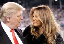 Donald Trump and Melania Trump looking at each other in a crowd