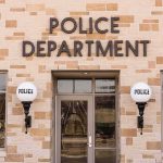 Arrest Made in Cold Case That Haunted Detectives for Decades Police department building entrance with signage