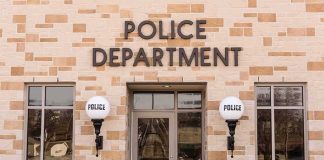 Arrest Made in Cold Case That Haunted Detectives for Decades Police department building entrance with signage